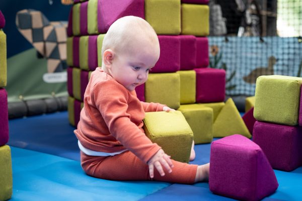 baby playing with blocks